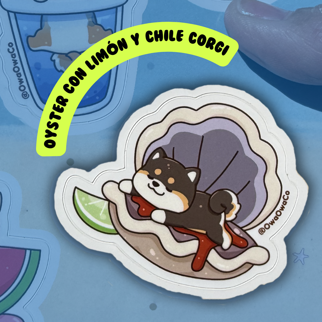 Owa Owa Treatlandia Sticker of a dog inside an oyster with lemon and chili on a blue background